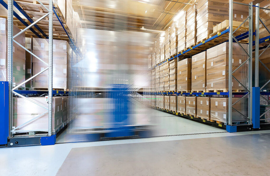 Clean and organized logistics center, featuring neatly arranged shelves.